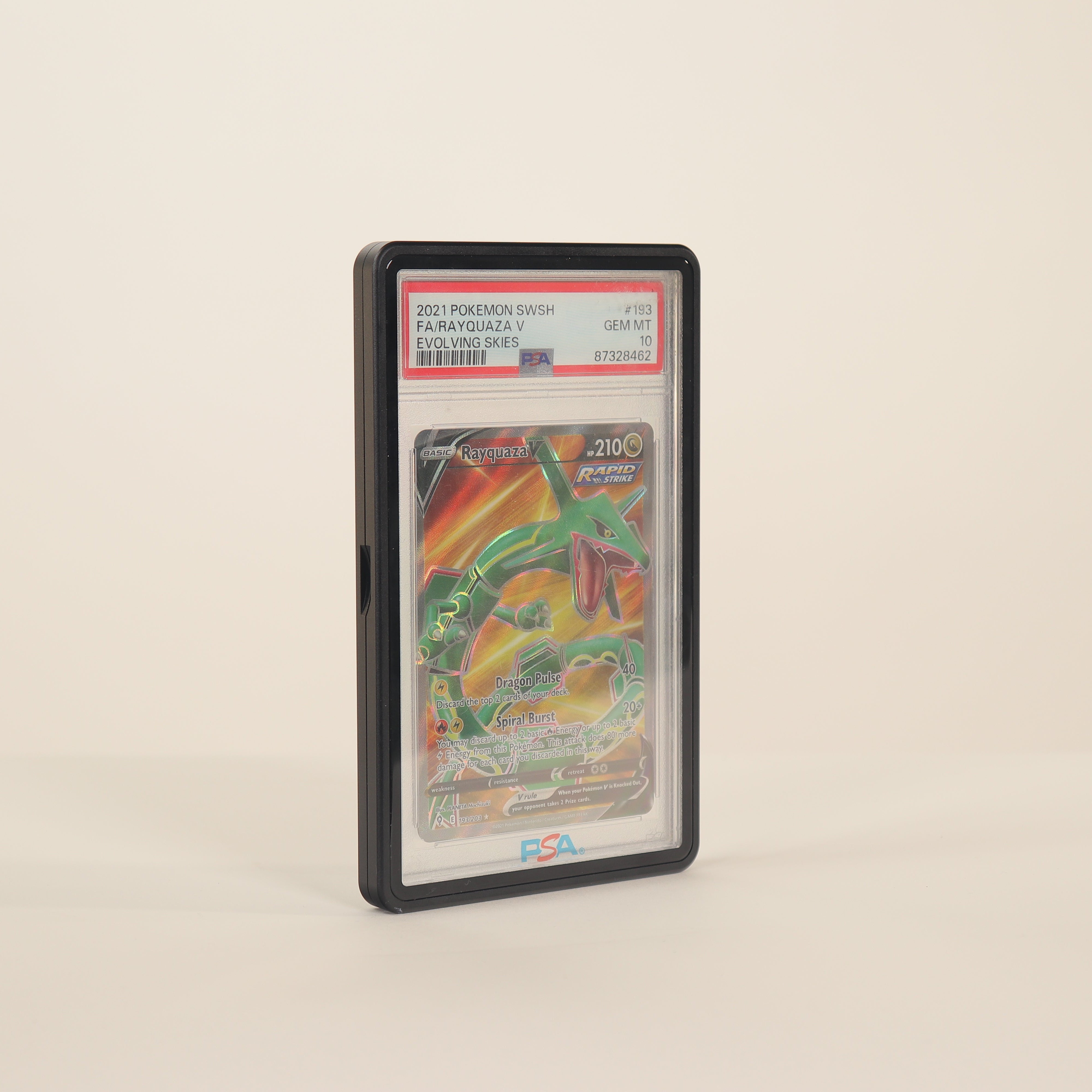 Trading card in a protective case on a beige background